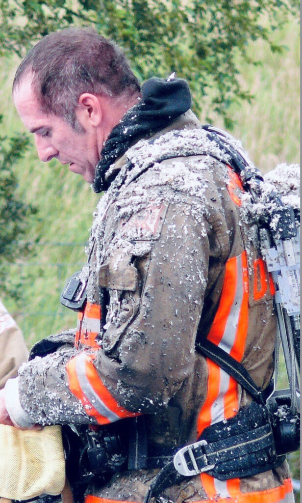 Firefighter Nickolaus Sprague at work